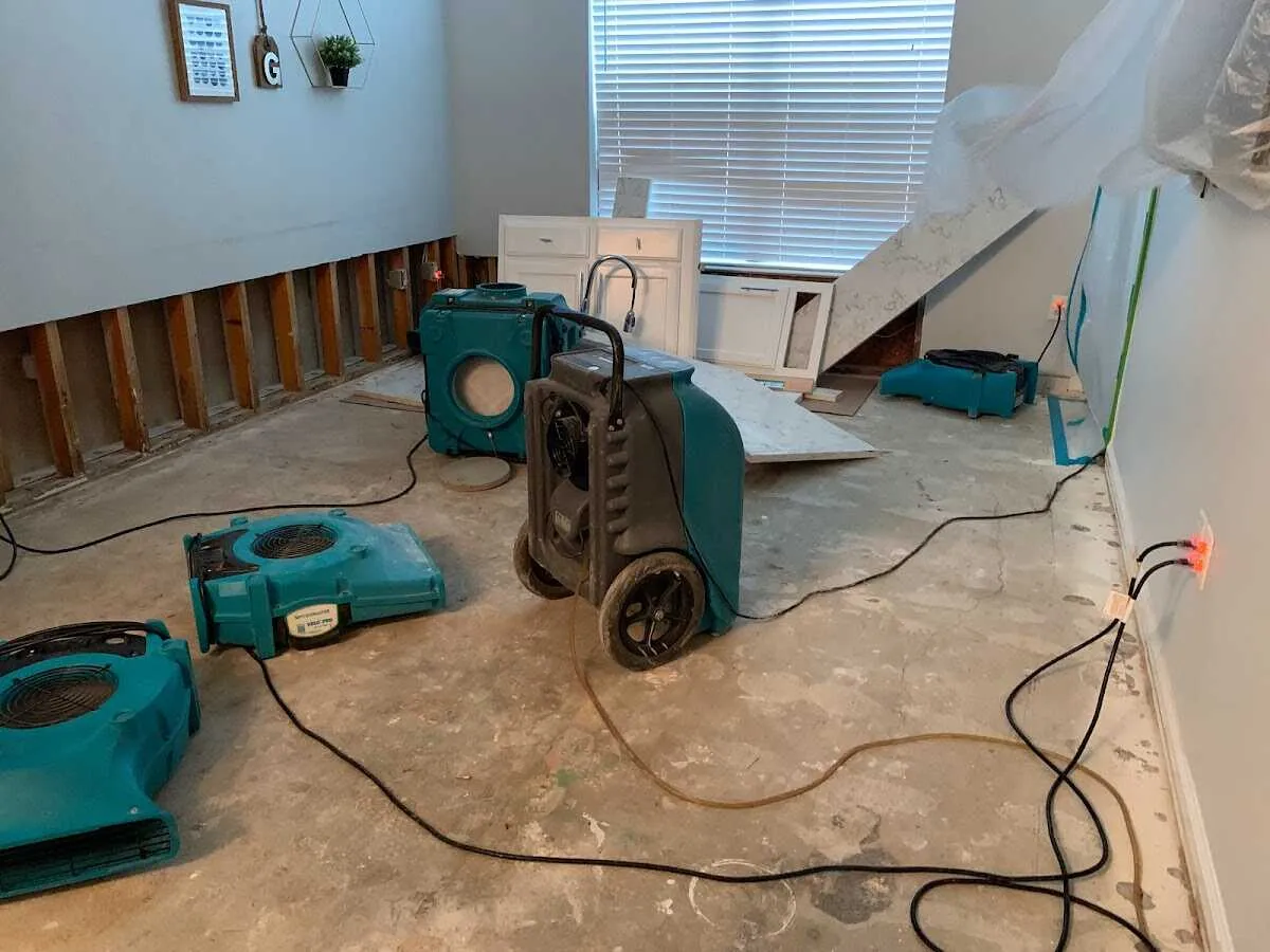 Dehumidifier in flood-cut room for Water Damage Restoration in Blythe